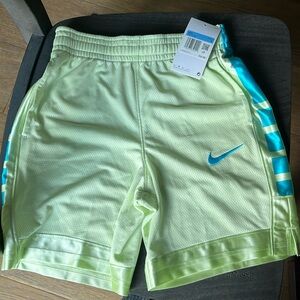 NIKE brand NEW with tags boys standard fit/ Dri-Fit basketball shorts Medium.